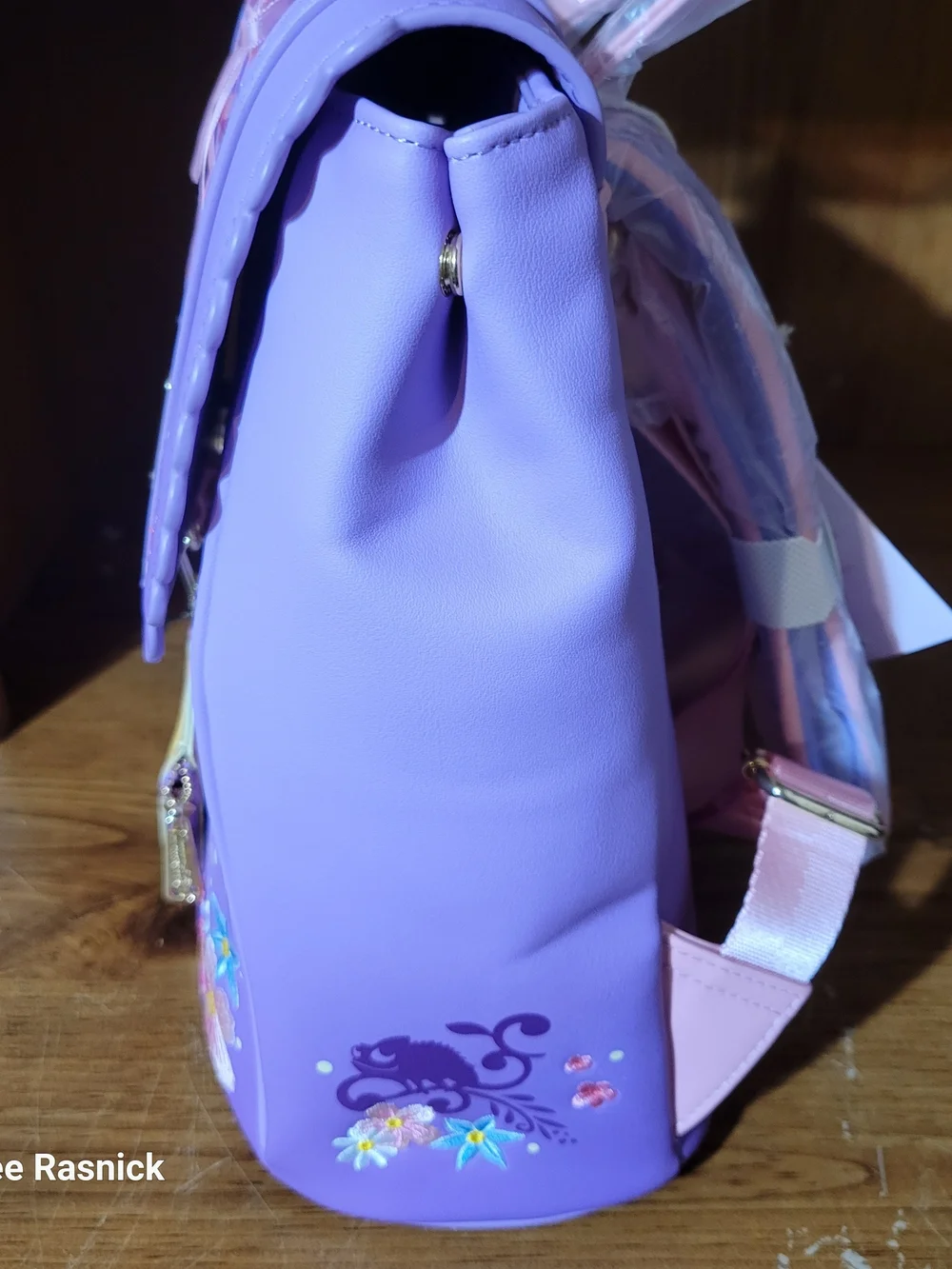 Loungefly Tangled Rapunzel Exclusive Floral Flap Mini Backpack with Coin Bag.